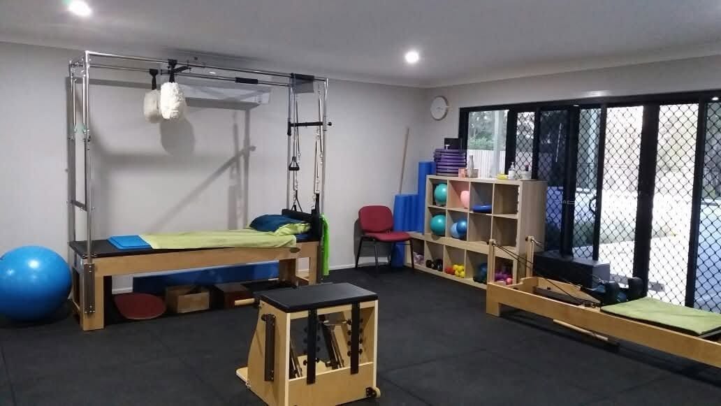 Our Pilates studio, set up with Reformer and Cadillac equipment
